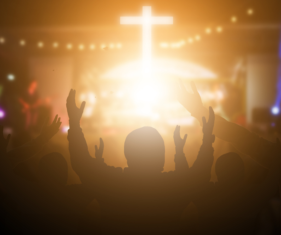 People backlit in worship.